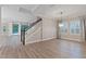 Open dining area with hardwood floors and access to the backyard at 13029 Paddock Wood Pl, Riverview, FL 33579