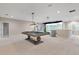 Game room with pool table, golf simulator and plenty of space at 13029 Paddock Wood Pl, Riverview, FL 33579