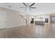 Bright living room showcasing hardwood floors and an open floor plan at 13029 Paddock Wood Pl, Riverview, FL 33579