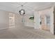 Large main bedroom with plush carpet, ensuite bathroom, and walk-in closet at 13029 Paddock Wood Pl, Riverview, FL 33579