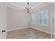 Bright home office with hardwood floors and plantation shutters at 13029 Paddock Wood Pl, Riverview, FL 33579