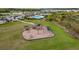 Community playground with play structures and shaded seating areas at 13029 Paddock Wood Pl, Riverview, FL 33579