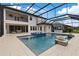 Resort-style pool with a spacious patio and outdoor entertainment area at 13029 Paddock Wood Pl, Riverview, FL 33579