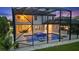 Expansive backyard oasis with a large pool and screened enclosure at 13029 Paddock Wood Pl, Riverview, FL 33579
