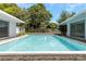 Large pool with surrounding deck and patio at 6685 17Th N St, St Petersburg, FL 33702
