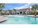 Community leisure pool with spray feature and seating at 13029 Paddock Wood Pl, Riverview, FL 33579