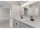 Modern bathroom with double vanity, quartz countertops, and black matte fixtures at 13029 Paddock Wood Pl, Riverview, FL 33579