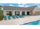Community pool cabana with seating and shade at 13029 Paddock Wood Pl, Riverview, FL 33579
