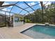 Covered outdoor bar area next to the pool at 13029 Paddock Wood Pl, Riverview, FL 33579