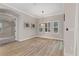 Bright dining room with wood floors and a stylish chandelier at 13029 Paddock Wood Pl, Riverview, FL 33579