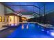 Private pool and patio with water features and outdoor lighting at 13029 Paddock Wood Pl, Riverview, FL 33579