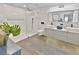 Modern bathroom with double sinks, a large shower, and marble tile at 2348 Silvermoss Dr, Wesley Chapel, FL 33544