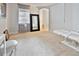 Bright spare bedroom with neutral color palette and large mirror at 2348 Silvermoss Dr, Wesley Chapel, FL 33544