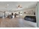 Open concept living area with kitchen and dining room views at 13012 Rain Lily Dr, Riverview, FL 33579