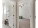 View into bedroom with carpeted floor and ceiling fan at 13012 Rain Lily Dr, Riverview, FL 33579