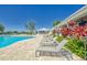 Comfortable lounge chairs next to the pool at 13012 Rain Lily Dr, Riverview, FL 33579