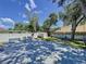 Backyard showcases a spacious wooden deck, shed, and white fence at 4477 67Th N St, St Petersburg, FL 33709