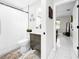 Tastefully updated bathroom with modern fixtures, stylish vanity, and a separate toilet area for added privacy at 4477 67Th N St, St Petersburg, FL 33709