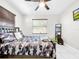 Relaxing bedroom showcasing camo-themed bedding, natural light, and neutral tones creating a cozy atmosphere at 4477 67Th N St, St Petersburg, FL 33709