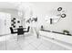 Bright dining area with modern light fixture, art, and decor at 4477 67Th N St, St Petersburg, FL 33709