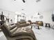 Spacious living room featuring leather furniture and modern decor, perfect for relaxation and entertaining guests at 4477 67Th N St, St Petersburg, FL 33709