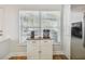 Coffee maker and Instant Pot sit on a white cabinet in the kitchen at 4538 Kennewick Pl, Riverview, FL 33578