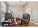Home office with a large desk, comfortable chair, and plenty of natural light at 4538 Kennewick Pl, Riverview, FL 33578