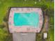 Community pool with plenty of lounge chairs for relaxation at 4538 Kennewick Pl, Riverview, FL 33578