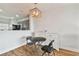 Small dining table with two chairs in the dining area at 4538 Kennewick Pl, Riverview, FL 33578