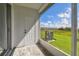 Screened-in porch with brick floor and view of backyard at 4538 Kennewick Pl, Riverview, FL 33578