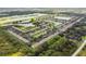 Aerial view of community with many houses and lakes nearby at 4538 Kennewick Pl, Riverview, FL 33578
