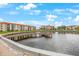 Serene waterfront view with a community dock at 19029 Us Highway 19 N # 6-19, Clearwater, FL 33764