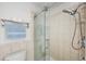 Modern bathroom featuring a large shower with glass enclosure at 19029 Us Highway 19 N # 6-19, Clearwater, FL 33764