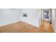 Bright dining room with light wood floors and pass-through kitchen at 19029 Us Highway 19 N # 6-19, Clearwater, FL 33764