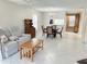 Open-concept living space with combined living, dining, and kitchen areas, perfect for entertaining at 120 Knollpoint Dr, Sun City Center, FL 33573