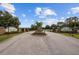 Gated entrance to Outlaw Lake Estates community at 24155 Hideout Trl, Land O Lakes, FL 34639