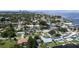 Aerial view of waterfront homes with private docks and lush landscaping at 537 Dolphin Se Ave, St Petersburg, FL 33705