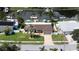 Bird's-eye view of a canal-front home with a private pool and boat dock at 537 Dolphin Se Ave, St Petersburg, FL 33705