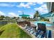 Relaxing backyard oasis with pool, patio furniture, and canal views at 537 Dolphin Se Ave, St Petersburg, FL 33705