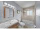Clean bathroom with a shower/tub combo and modern vanity at 537 Dolphin Se Ave, St Petersburg, FL 33705