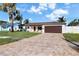 Attractive single story home with paver driveway and lush landscaping at 537 Dolphin Se Ave, St Petersburg, FL 33705