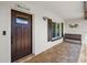 Inviting front entrance with a welcoming bench at 537 Dolphin Se Ave, St Petersburg, FL 33705