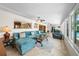 Spacious Gathering room with sectional sofa and access to patio at 537 Dolphin Se Ave, St Petersburg, FL 33705