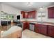 Spacious kitchen with granite countertops and stainless steel appliances at 537 Dolphin Se Ave, St Petersburg, FL 33705