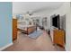 Spacious main bedroom with wood flooring and access to a deck at 537 Dolphin Se Ave, St Petersburg, FL 33705