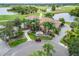 Community golf clubhouse with adjacent parking at 120 Knollpoint Dr, Sun City Center, FL 33573