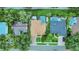 Aerial view showing house location and surrounding properties at 1025 Misty Hollow Ln, Tarpon Springs, FL 34688