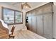 Well-designed bedroom with built-in cabinets and wood flooring at 833 Bay Point Dr, Madeira Beach, FL 33708