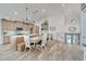 Spacious kitchen with island, light wood cabinets and modern appliances at 833 Bay Point Dr, Madeira Beach, FL 33708