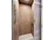 Modern elevator with wood paneling and metal accents at 833 Bay Point Dr, Madeira Beach, FL 33708